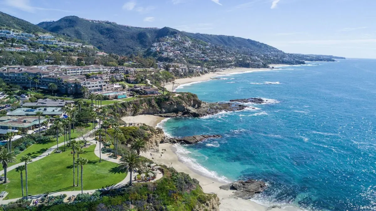 Orange County coastline with a beach, park and hillside homes